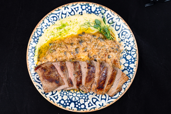 Pork fillet with creamy mushroom sauce and potato mash