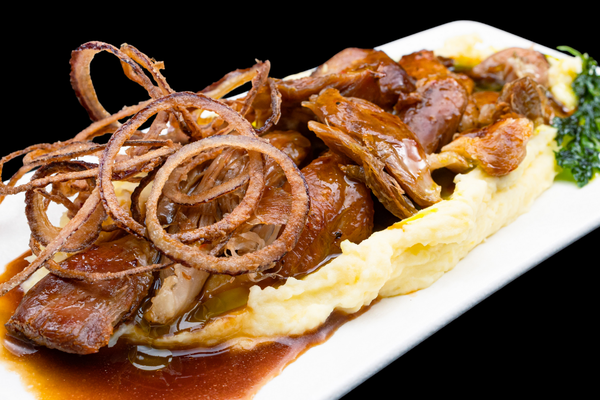 Slow-Cooked Pork Shank (Boneless) with Mashed Potatoes, Roasted Sauce & crispy Onions